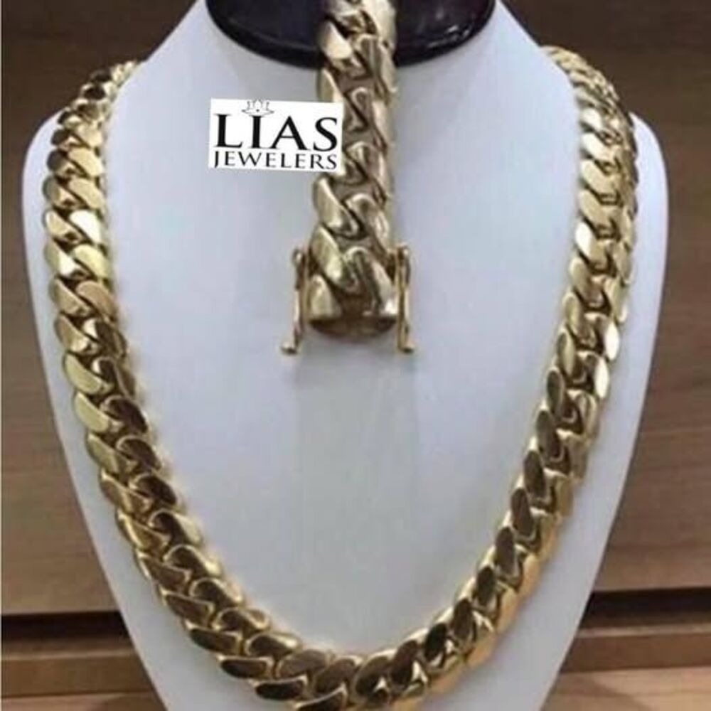 New 18k yellow gold Cuban link chain and bracelet